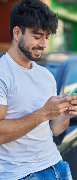 $2500 Merchant Services Affiliate Program by Total Merchant Services featuring young man on phone.