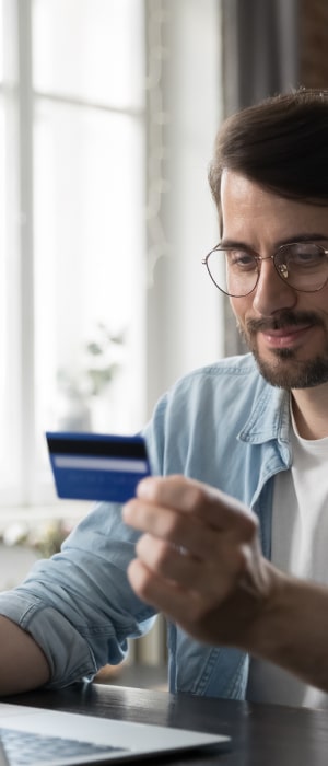 B2B Credit Card Processing by Total Merchant Services featuring business man completing a transaction.