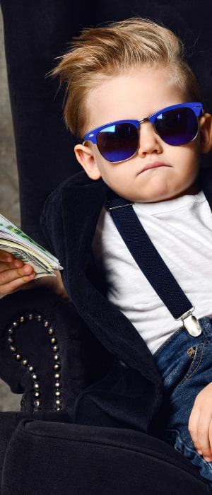 Cash Advance Merchant Services program by Total Merchant Services featuring a child holding cash.